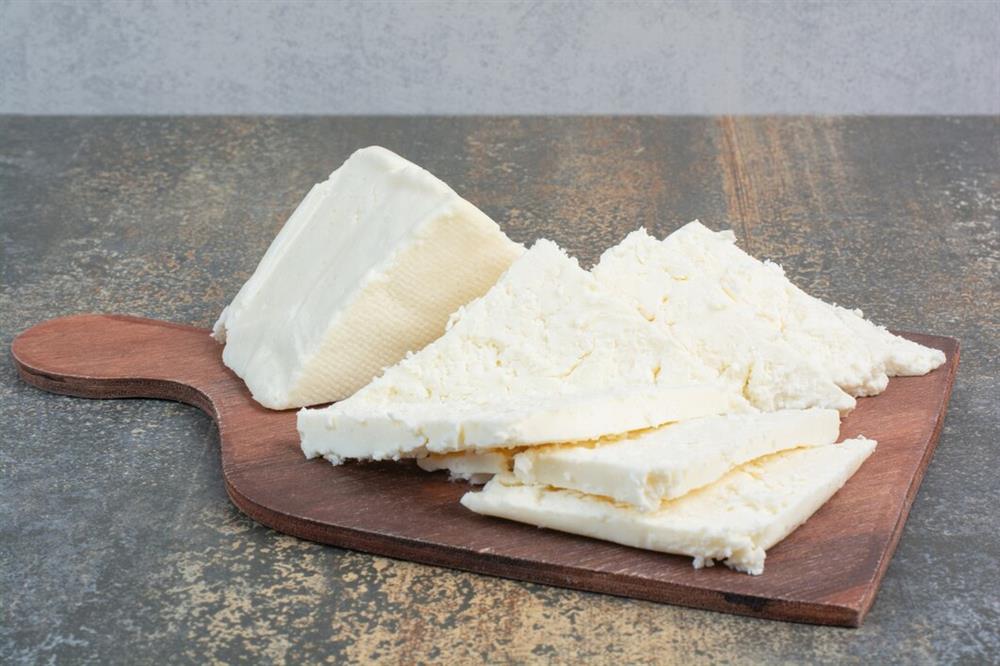 various-white-cheese-wooden-board