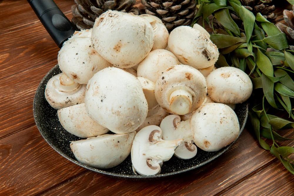 side-view-fresh-white-mushrooms