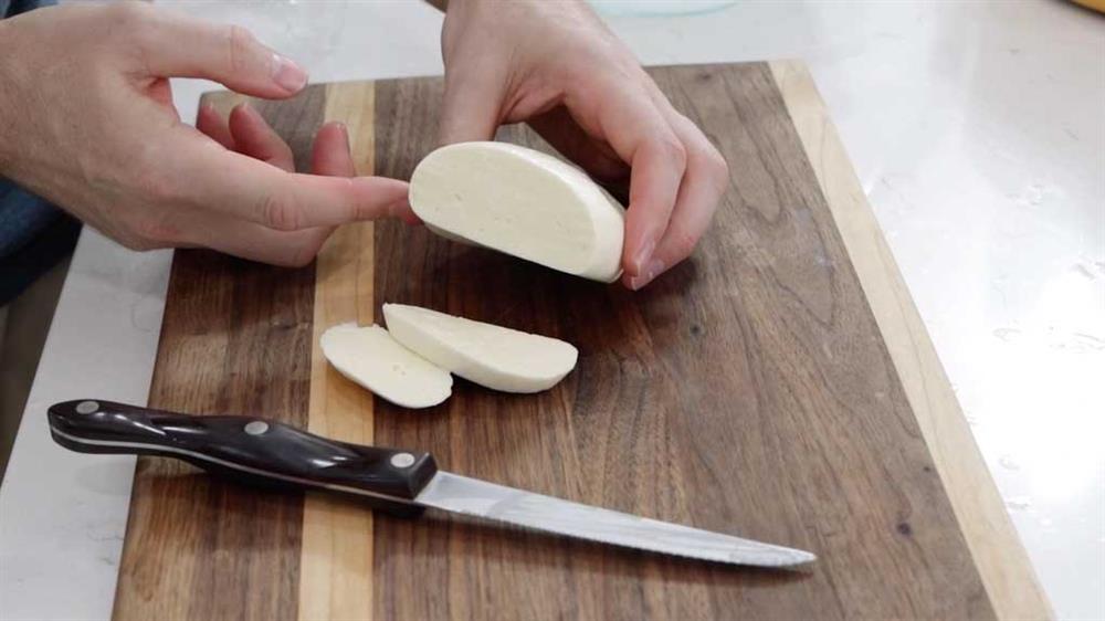 Sliced homemade mozzarella cheese