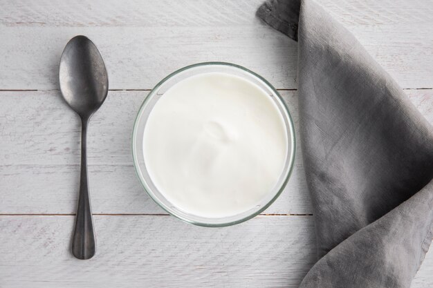 top-view-bowl-with-yogurt-spoon